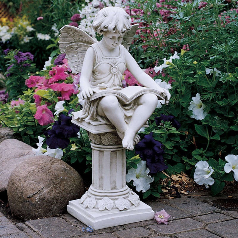british reading fairy statue
